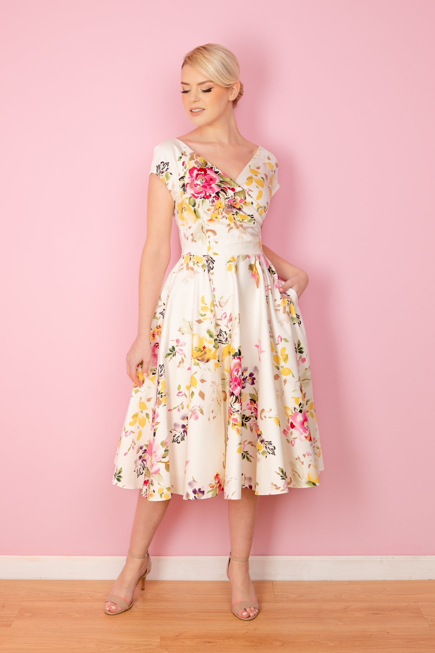 Hourglass Seville Swing Dress in bold floral Seville print – made in the UK by The Pretty Dress Company