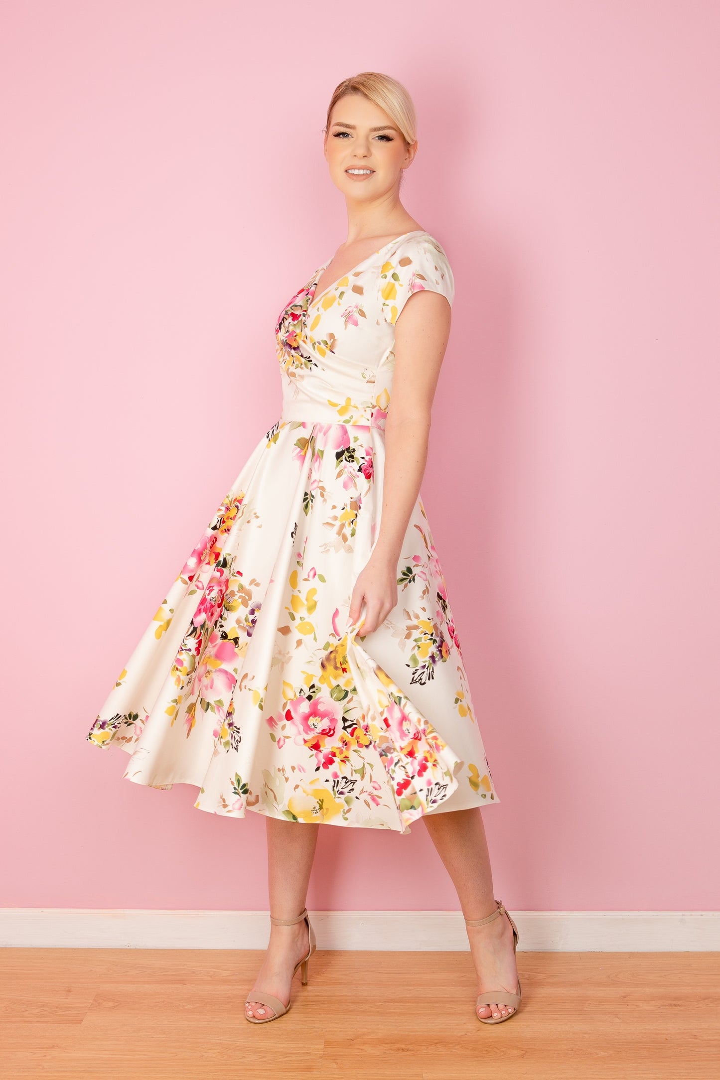 Hourglass Seville Swing Dress in bold floral Seville print – made in the UK by The Pretty Dress Company