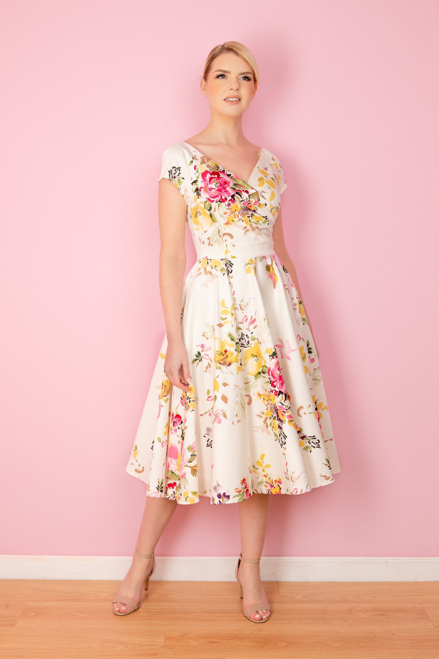 Hourglass Seville Swing Dress in bold floral Seville print – made in the UK by The Pretty Dress Company