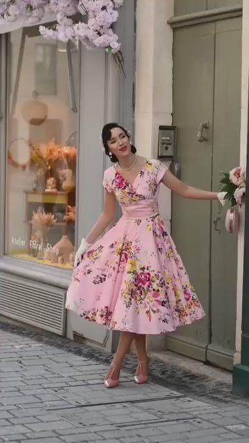 Hourglass Seville Swing Dress in bold floral Seville print – made in the UK by The Pretty Dress Company